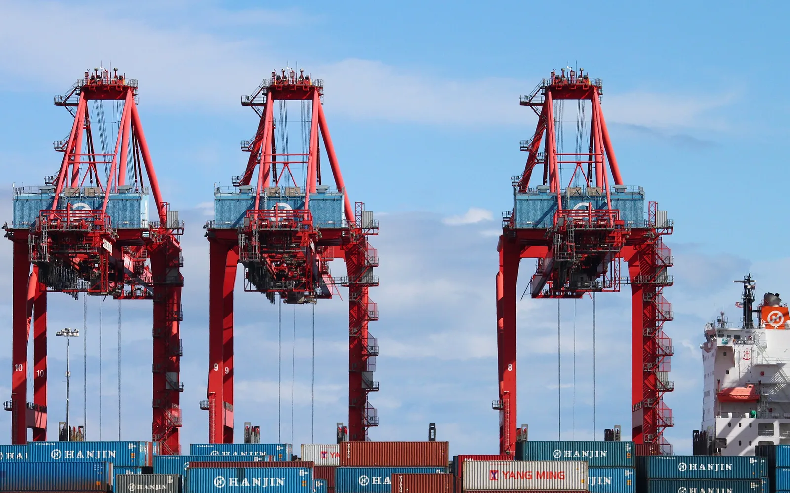 Container cranes at the Port of Long Beach, regional logistics context.